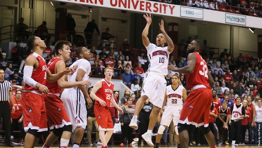 Senior point guard T.J. Williams (10) dropped a career high 30 points to lead NU to an 87-77 opening night victory over Boston University (Image Credit: Northeastern Athletics). 