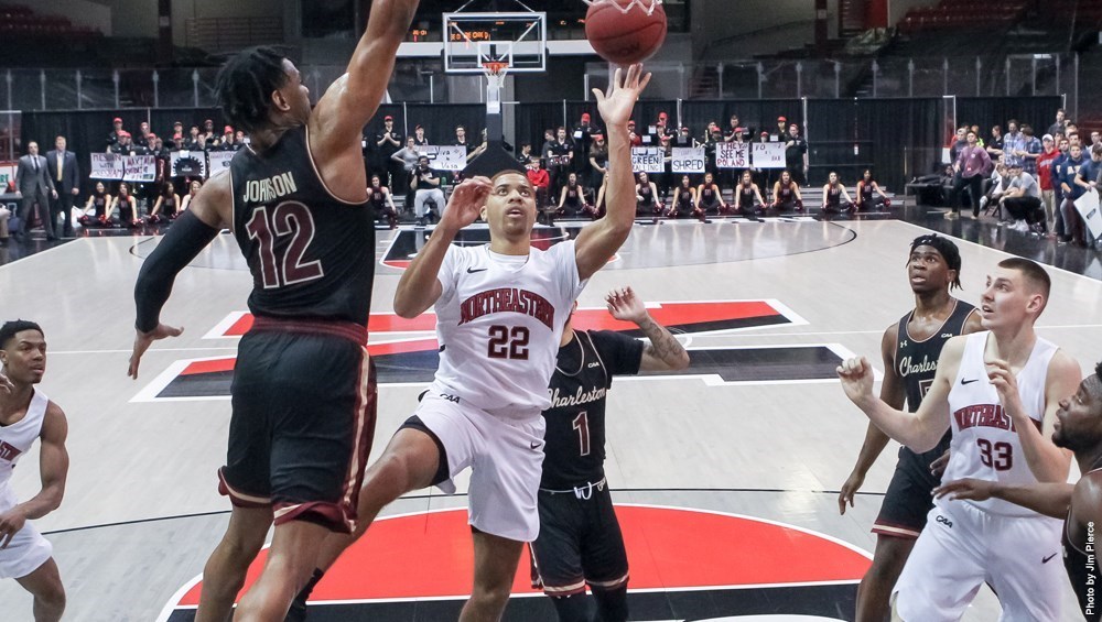 Donnell Gresham Jr. and Northeastern are seeking a CAA championship in North Charleston this week. (Image Credit: GoNU)
